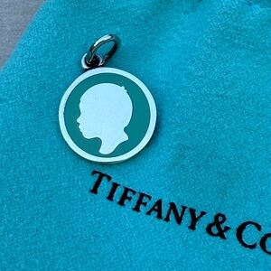 Tiffany & Co. Blue & Sterling Silver Silhouette Boy Charm, retired and rare.
